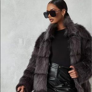 Faux Fur Coat Love it, but it does not fit